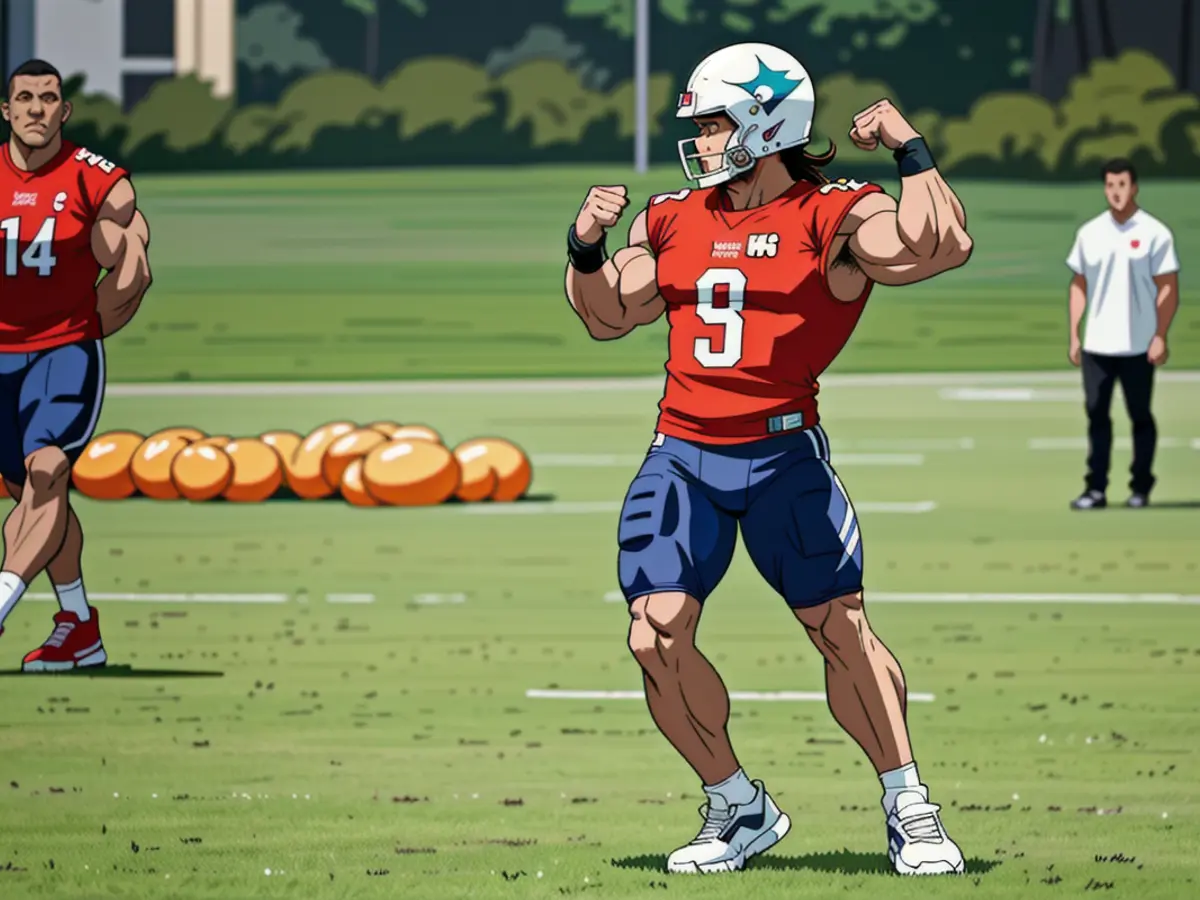 Tua Tagovailoa, quarterback dei Miami Dolphins, si allena nell'atteggiamento del passaggio alla...
